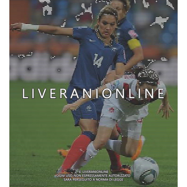 BOCHUM, July 1, 2011 France\'s player Louisa Necib (L) vies with Canada\'s Diana Matheson during the second round Group A match between France and Canada at the FIFA Women\'s World Cup Germany 2011 in Bochum, Germany, June 30, 2011. France won the match 4 0. (/Ma Ning) (djj)