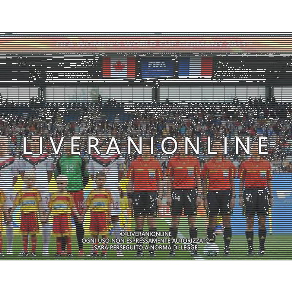 BOCHUM, July 1, 2011 Assistant Referee Zhang Lingling from China (4th R) is seen during the second round Group A match between France and Canada at the FIFA Women\'s World Cup Germany 2011 in Bochum, Germany, June 30, 2011. Zhang is the only Chinese referee at the FIFA Women\'s World Cup Germany 2011. (/Wu Wei) (djj)