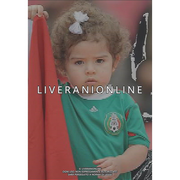 LEVERKUSEN, July 1, 2011 ()A 2 year old girl cheers for Mexican team before the second round Group B match between Japan and Mexico at the FIFA Women\'s World Cup Germany 2011 in Leverkusen, Germany, July 1, 2011. (/Wu Wei)(wll)