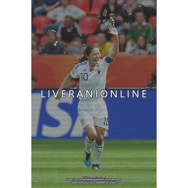LEVERKUSEN, July 1, 2011 ()Homare Sawa of Japan celebrates scoring during the second round Group B match between Japan and Mexico at the FIFA Women\'s World Cup Germany 2011 in Leverkusen, Germany, July 1, 2011. (/Ma Ning)(wll)