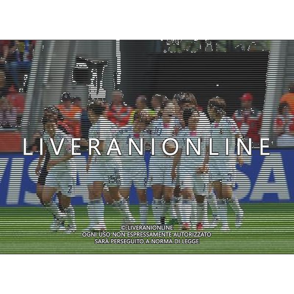 LEVERKUSEN, July 1, 2011 ()Homare Sawa (No.10) of Japan celebrates scoring with her teammates during the second round Group B match between Japan and Mexico at the FIFA Women\'s World Cup Germany 2011 in Leverkusen, Germany, July 1, 2011. (/Ma Ning)(wll)