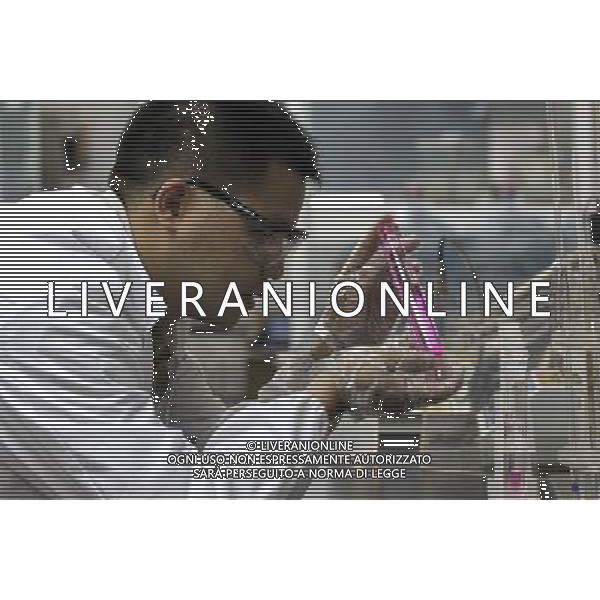 NANTONG, June 29, 2011 A worker tests samples of waste water in a lab in Dow AgroSciences China Ltd. in Nantong City, east China\'s Jiangsu Province, June 23, 2011. Dow AgroSciences, a wholly owned subsidiary of The Dow Chemical Company and one of the world\'s top five agrochemical companies, entered Chinese market in the 1970s as the first batch of foreign companies investing in China. After more than 30 years of development in China, Dow AgroSciences is now able to annually rake in 100 million US dollars of sales revenues from China. Though having set foothold in China for years, the agrichemical company did not set up its China headquarter until May this year when Dow AgroSciences China Ltd. decided to make its pesticide manufacturing joint venture Nantong DAS Chemical Co., Ltd. as a headquarter. It is by no means a rash decision as the US based company had observed the plant as well as China\'s investment environment for nearly 10 years. DAS Chemical Co., Ltd. was established in 2001 and since then the plant has been engaged in production of Dithane M 45, a heavyweight pesticide product of Dow AgroSciences. Within 10 years, the joint venture grew to be a leading Dithane M 45 supplier to Asia, Europe and Africa partly because of China\'s sound investment environment. This also renders the parent company The Dow Chemical to make a decision to gear up investment in the joint venture in 2010. \'It is sound investment and promising outlook here that attract us most and we will definitely boost our investment in China,\' said LaRoza Jorge, president of Dow AgroSciences Asia Region in May. By far, the production capacity of Nantong DAS Chemical Co., Ltd. has been expanded to 700 metric tons (tonnes) per month from the previous 450 tonnes. Dow AgroSciences also plans to expand both production and R\'D capacities in Nantong DAS Chemical in 2011. In the past dozens of years, AgroSciences built partnership with scores of research institutes and universities