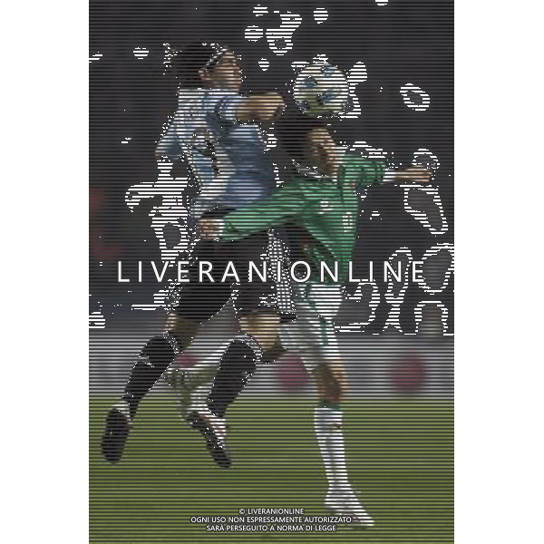 (110702) -- LA PLATA, July 2, 2011 -- Ever Banega (L) of Argentina fights for the ball with Joselito Vaca of Bolivia during the opening match of Copa America 2011 in La Plata, Argentina, on July 1, 2011. The two teams played to a 1-1 tie. Alberto Ragio) (djj)