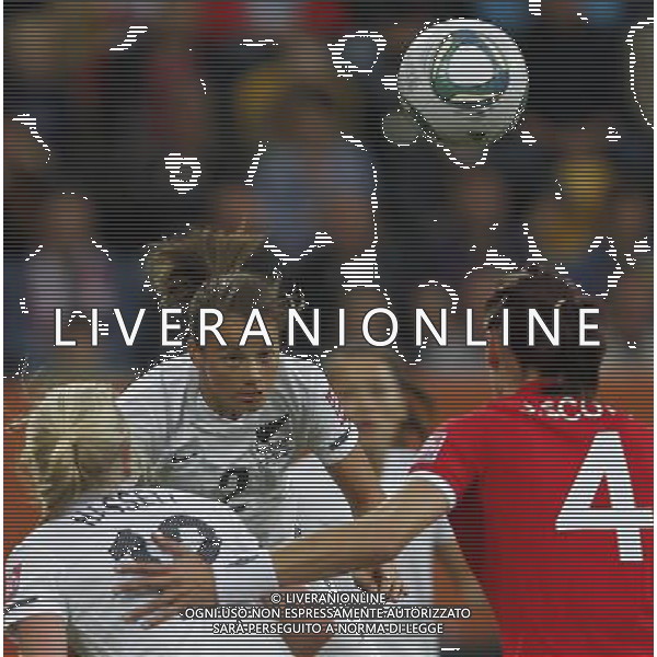 (110701) -- DRESDEN, July 1, 2011 -- New Zealand\'s Ria Percival (Top) heads for the ball during the second round Group B match between New Zealand and England at the 2011 FIFA Women\'s World Cup in Dresden, Germany, July 1, 2011. England beat New Zealand 2-1. Ding Xu) (wjd) ©PHOTOSHOT/Agenzia Aldo Liverani Sas - ITALY ONLY: INGHILTERRA - NUOVA ZELANDA Campionati Mondiali di calcio femminile FIFA Cup Germania 2011