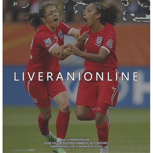 (110701) -- DRESDEN, July 1, 2011 -- England\'s Jessica Clarke (R) celebrates after she scores during the second round Group B match between New Zealand and England at the 2011 FIFA Women\'s World Cup in Dresden, Germany, July 1, 2011. England beat New Zealand 2-1. Ding Xu) (wjd) ©PHOTOSHOT/Agenzia Aldo Liverani Sas - ITALY ONLY: INGHILTERRA - NUOVA ZELANDA Campionati Mondiali di calcio femminile FIFA Cup Germania 2011