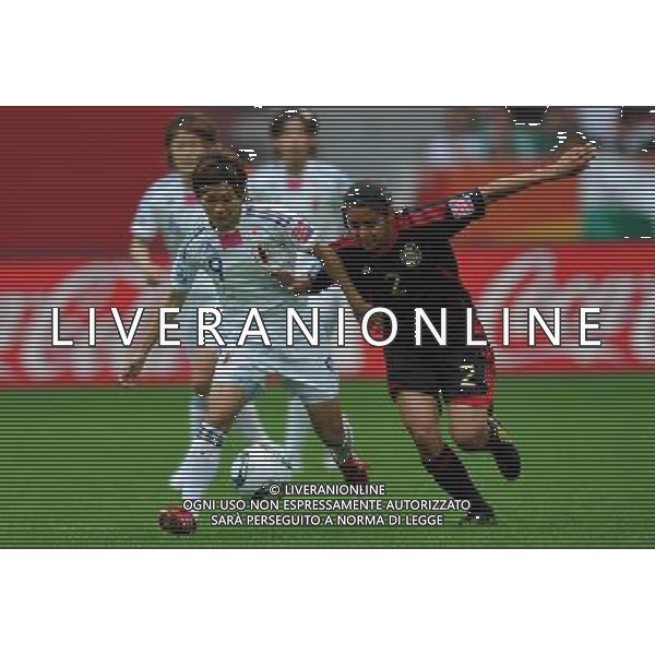 (110701) -- LEVERKUSEN, July 1, 2011 -- Nahomi Kawasumi(L) of Japan vies with Kenti Robles of Mexico during the second round Group B match between Japan and Mexico at the FIFA Women\'s World Cup Germany 2011 in Leverkusen, Germany, July 1, 2011. Ma Ning)(wll) ©PHOTOSHOT/Agenzia Aldo Liverani Sas - ITALY ONLY: GIAPPONE - MESSICO Campionati Mondiali di calcio femminile FIFA Cup Germania 2011
