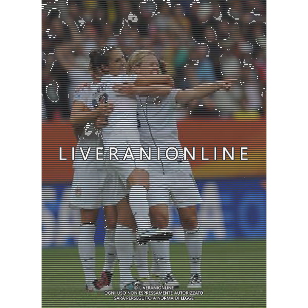 (110702) -- SINSHEIM, July 2, 2011 () -- U.S. player Carli Lloyd (L front) celebrates her goal during the second round Group C match between the United States and Colombia at the 2011 FIFA Women\'s World Cup in Sinsheim, Germany, July 2, 2011. The United States beat Colombia 3-0. (/Xu Liang) (zw) ©PHOTOSHOT/Agenzia Aldo Liverani Sas - ITALY ONLY: COLOMBIA - STATI UNITI USA Campionati Mondiali di calcio femminile FIFA Cup Germania 2011
