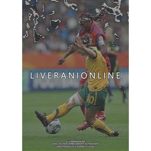 (110703) -- BOCHUM, July 3, 2011 () -- Anonman(Top) of Equatorial Guinea vies with Servet Uzunlar of Australia during the second round Group D match between Australia and Equatorial Guinea at the FIFA Women\'s World Cup Germany 2011 in Bochum, Germany, July 3, 2011. (/Wu Wei)(wll)