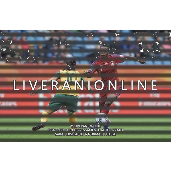 (110703) -- BOCHUM, July 3, 2011 () -- Diala(R) of Equatorial Guinea vies with Servet Uzunlar of Australia during the second round Group D match between Australia and Equatorial Guinea at the FIFA Women\'s World Cup Germany 2011 in Bochum, Germany, July 3, 2011. (/Wu Wei)(wll)