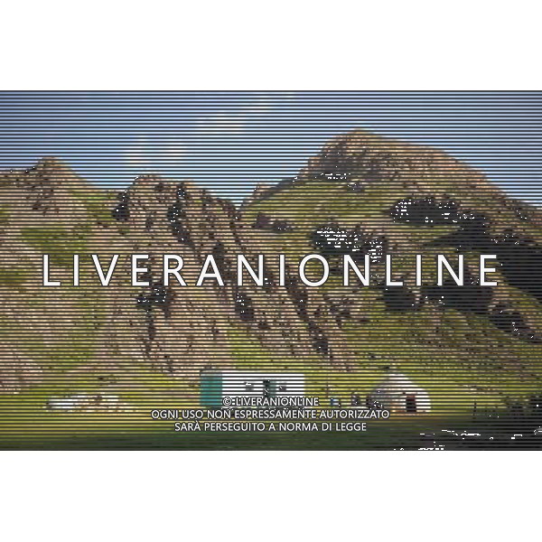 BISHKEK, July 1, 2011 Photo taken on June 30, 2011 shows the scenery of Naryn State, Kyrgyzstan. Kyrgyzstan, famous for its mountain and valley scenery with 90 percent of its territory more than 1,500 meters above sea level, is called \'Switzerland in central Asia\'. (/Sadat) (lr)