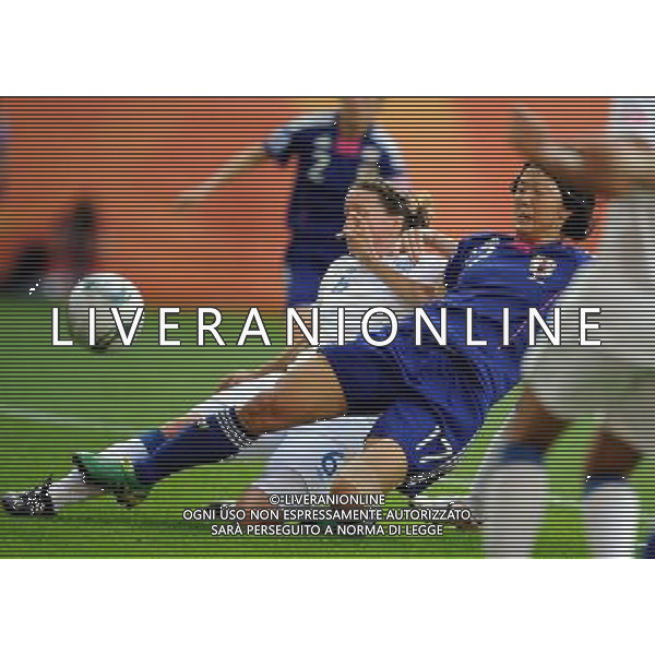 (110706) -- AUGSBURG, July 6, 2011 () -- Casey Stoney (front L) of England vies with Yuki Nagasato of Japan during their 3rd round Group B match at the FIFA Women\'s World Cup Germany 2011 in Augsburg, Germany, July 5, 2011. (/Li Jundong)