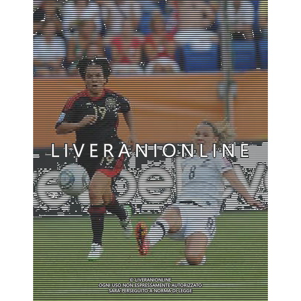 (110706) -- SINSHEIM, July 6, 2011 () -- Hayley Moorwood (R) of New Zealand competes during the 3rd round Group B match against Mexico at the FIFA Women\'s World Cup Germany 2011 in Sinsheim, Germany, July 5, 2011. (/Xu Liang)(lm)