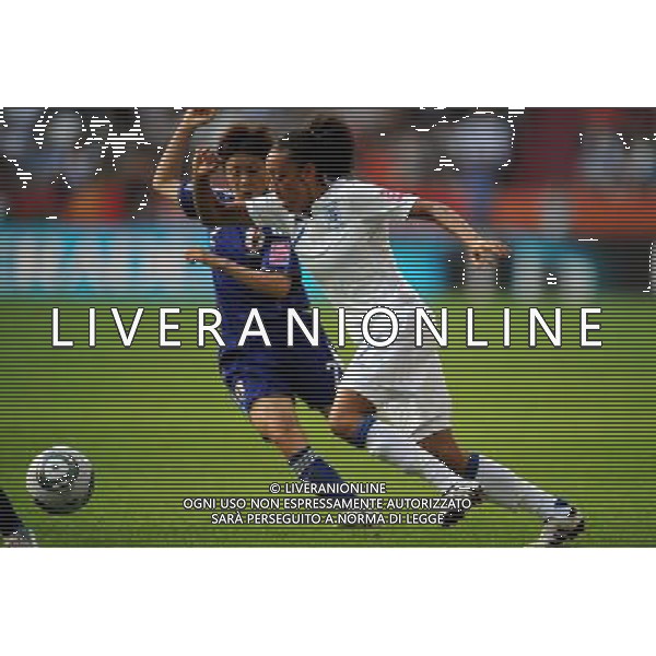 (110706) -- AUGSBURG, July 6, 2011 () -- Jessica Clarke (R) of England competes during the 3rd round Group B match between England and Japan at the FIFA Women\'s World Cup Germany 2011 in Augsburg, Germany, July 5, 2011. (/Li Jundong)