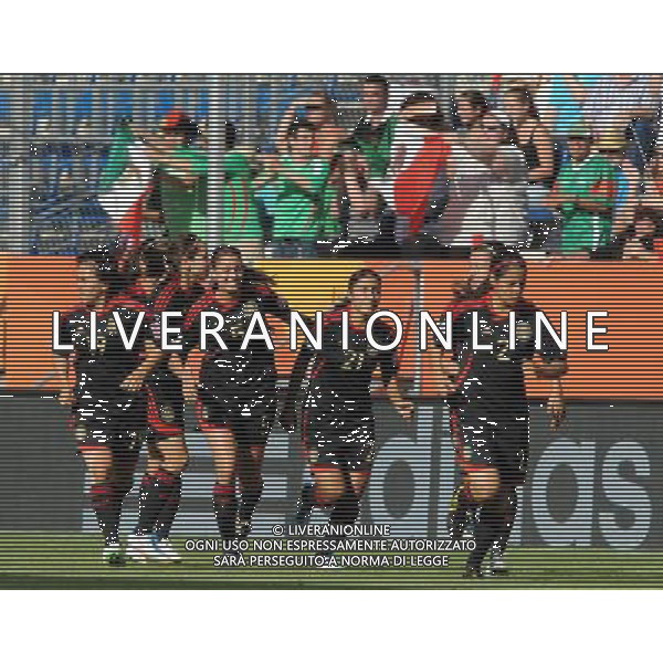 (110706) -- SINSHEIM, July 6, 2011 () -- Stephany Mayor (No.21) of Mexico celebrates for her goal with her teammates during the 3rd round Group B match between Mexico and New Zealand at the FIFA Women\'s World Cup Germany 2011 in Sinsheim, Germany, July 5, 2011. (/Xu Liang)(lm)