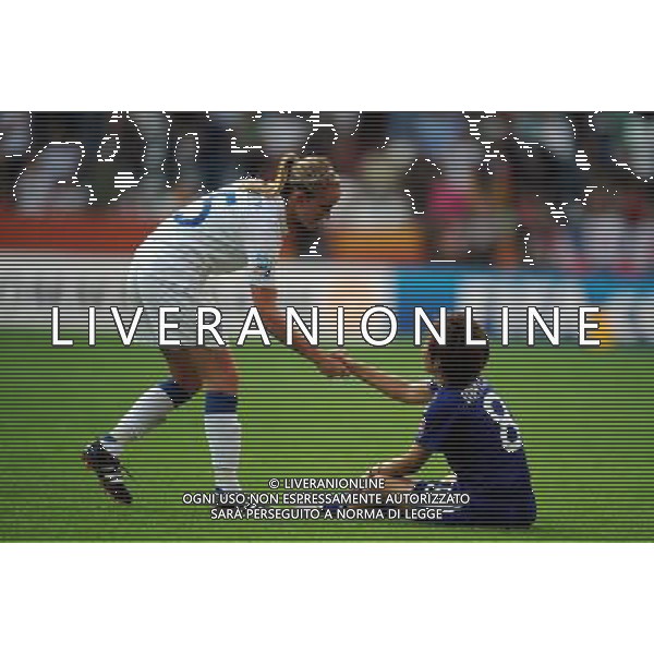 (110706) -- AUGSBURG, July 6, 2011 () -- Sophie Bradley (L) of England shakes hands with Aya Miyama of Japan after their 3rd round Group B match at the FIFA Women\'s World Cup Germany 2011 in Augsburg, Germany, July 5, 2011. England won 2-0. (/Li Jundong)