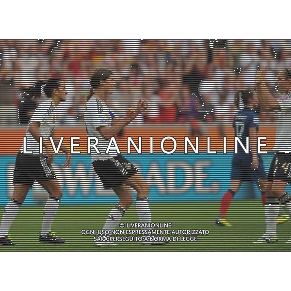 (110706) -- MOENCHENGLADBACH, July 6, 2011 () -- Kerstin Garefrekes (2nd L) of Germany celebrates her goal during the third round Group A match between France and Germany at the FIFA Women\'s World Cup Germany 2011 in Moenchengladbach, Germany, July 5, 2011. (/Ma Ning)