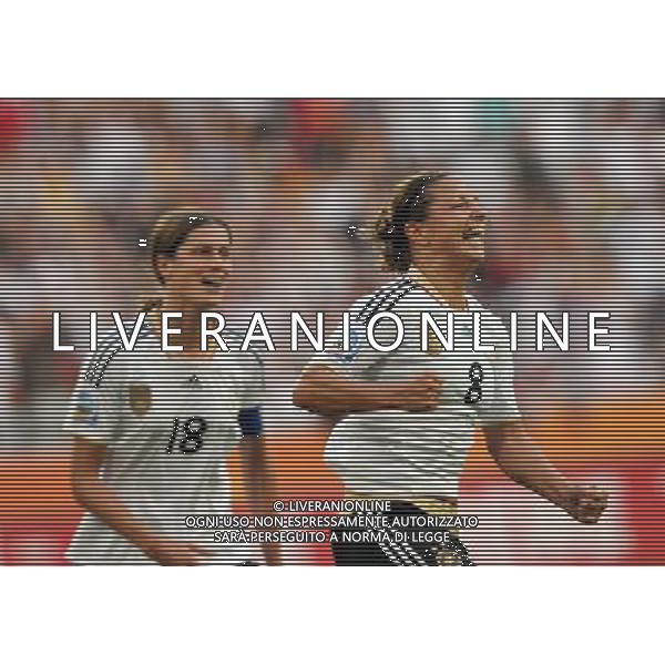 (110706) -- MOENCHENGLADBACH, July 6, 2011 () -- Inka Grings (R) of Germany celebrates her goal during the third round Group A match between France and Germany at the FIFA Women\'s World Cup Germany 2011 in Moenchengladbach, Germany, July 5, 2011.(/Ma Ning)