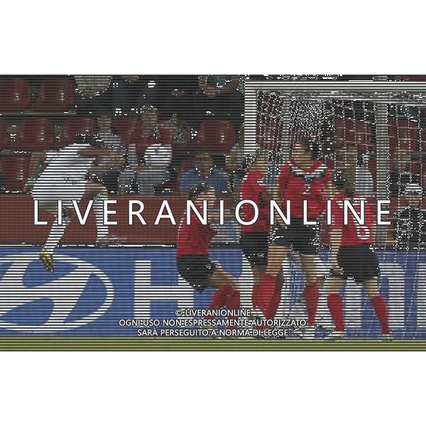 (110706) -- DRESDEN, July 6, 2011 () -- Nigeria\'s Desire Oparanozie (L) heads for the ball in front of Canada\'s gate during their Group A third round match at the 2011 FIFA Women\'s World Cup at the Rudolf-Harbig-Stadion in Dresden, Germany, July 5, 2011. Nigeria won the match 1-0. Either team advanced to the next round. (/Ding Xu)