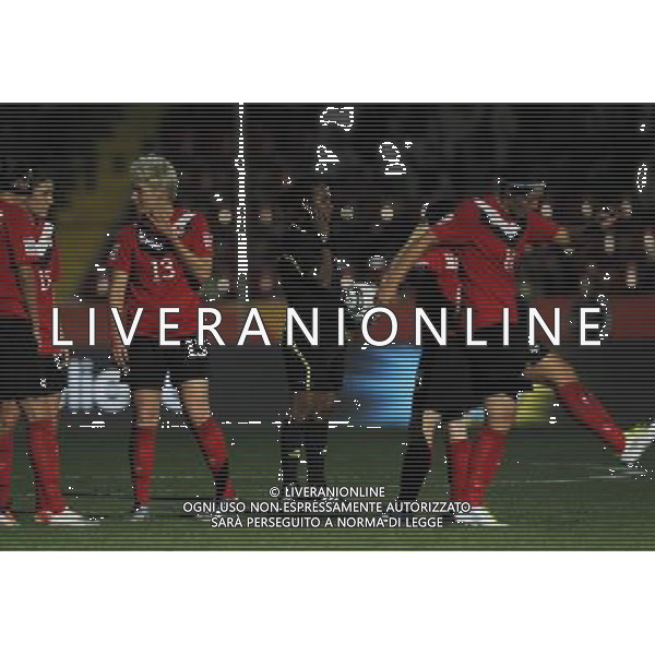 (110706) -- DRESDEN, July 6, 2011 () -- The referee Finau Vulivuli (C) contacts LOC through earphone when the power is off during the Group A third round match between Canada and Nigeria at the 2011 FIFA Women\'s World Cup at the Rudolf-Harbig-Stadion in Dresden, Germany, July 5, 2011. (/Ding Xu)