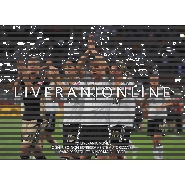 (110706) -- MOENCHENGLADBACH, July 6, 2011 () -- Players of Germany celebrate their victory after the third round Group A match between France and Germany at the FIFA Women\'s World Cup Germany 2011 in Moenchengladbach, Germany, July 5, 2011. Germany won the match 4-2.(/Ma Ning)