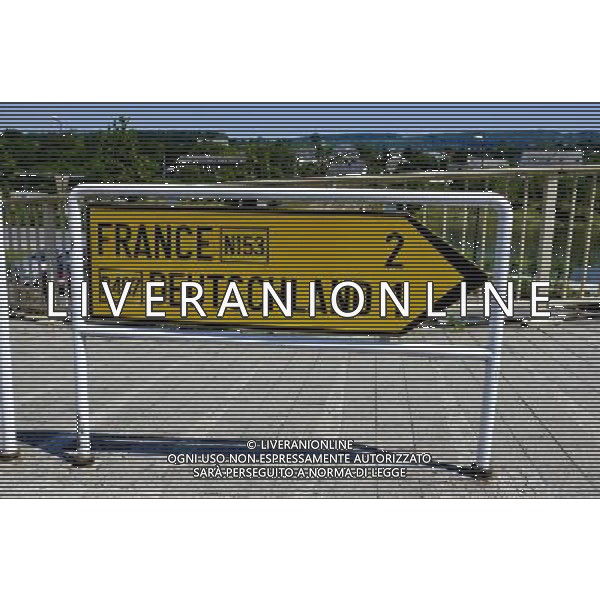 Sign France, Deutschland in Schengen, Luxembourg on 2011-07-04 - The Schengen Area comprises the territories of twenty-five European countries that have implemented the Schengen Agreement signed in the town of Schengen, Luxembourg, in 1985. The Schengen Area operates very much like a single state for international travel with border controls for those travelling in and out of the area, but with no internal border controls