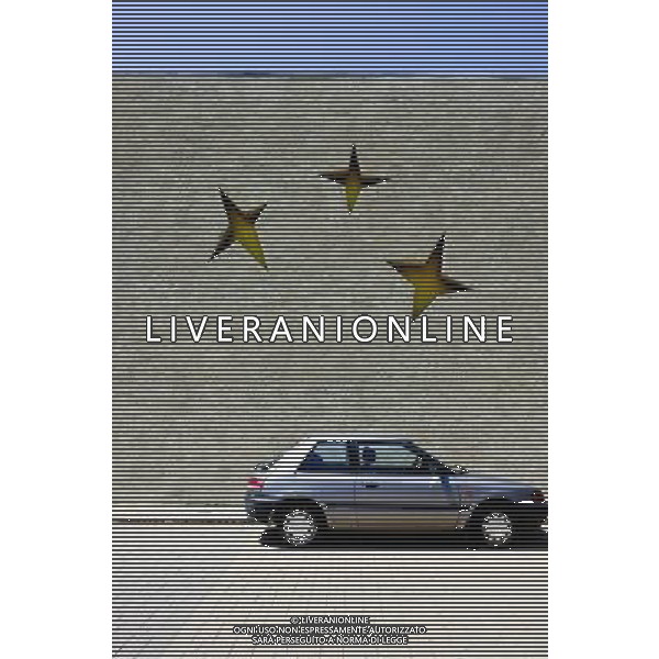 Symbolic European Stars on the wall in Schengen, Luxembourg on 2011-07-04 - The Schengen Area comprises the territories of twenty-five European countries that have implemented the Schengen Agreement signed in the town of Schengen, Luxembourg, in 1985. The Schengen Area operates very much like a single state for international travel with border controls for those travelling in and out of the area, but with no internal border controls