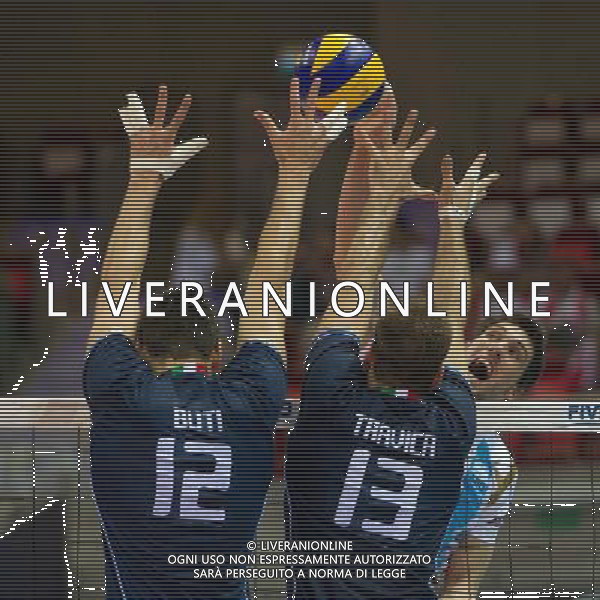 06.07.2011 - Gdansk , ERGO Arena , Siatkowka mezczyzn (Volleyball men\'s) , Finaly Ligi Swiatowej 2011 , FIVB World League Final 2011 , Argentina - Italy N/Z Buti , Travica Fot. Mariusz Palczynski / Edytor.net / Newspix.pl --- Newspix.pl *** Local Caption *** www.newspix.pl mail us: info@newspix.pl call us: 0048 022 23 22 222 --- Polish Picture Agency by Ringier Axel Springer Poland