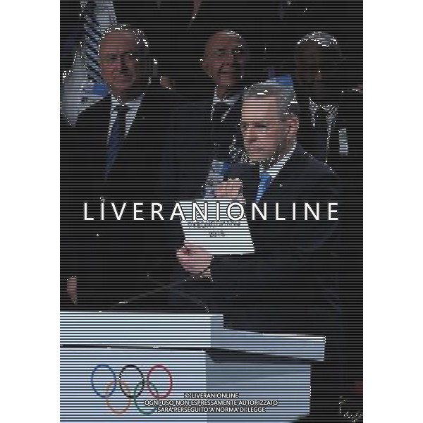 (110707) -- DURBAN, July 7, 2011 () -- International Olympic Committee (IOC) President Jacques Rogge (front R) holds up the card naming Pyeongchang as the host of the 2018 Winter Olympics during the 123rd IOC session in Durban, South Africa July 6, 2011. (/Li Qihua)(lm)