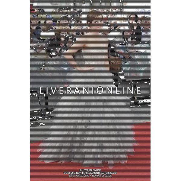 Actress Emma Watson attends the World Premiere of Harry Potter and The Deathly Hallows - Part 2 at Trafalgar Square on July 7, 2011 in London, England.