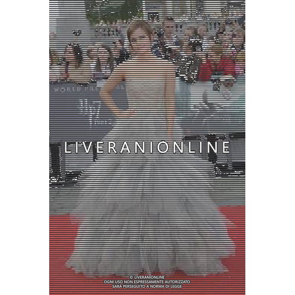 Actress Emma Watson attends the World Premiere of Harry Potter and The Deathly Hallows - Part 2 at Trafalgar Square on July 7, 2011 in London, England.