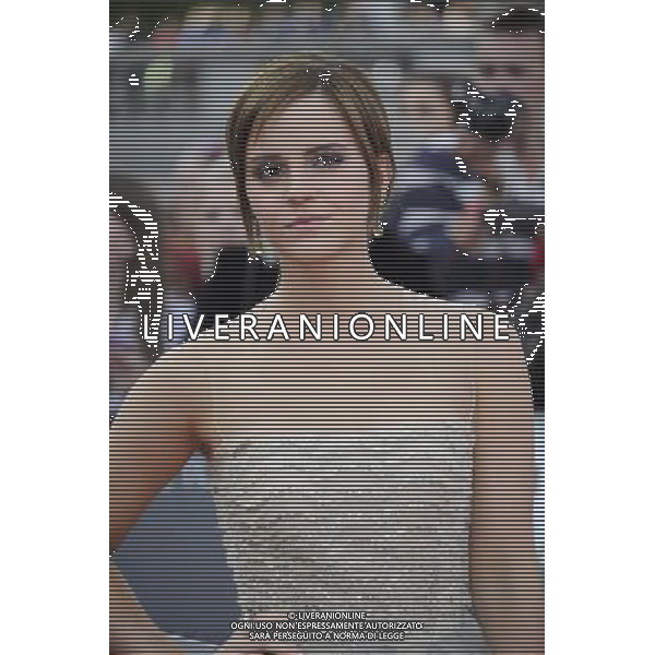 Actress Emma Watson attends the World Premiere of Harry Potter and The Deathly Hallows - Part 2 at Trafalgar Square on July 7, 2011 in London, England.