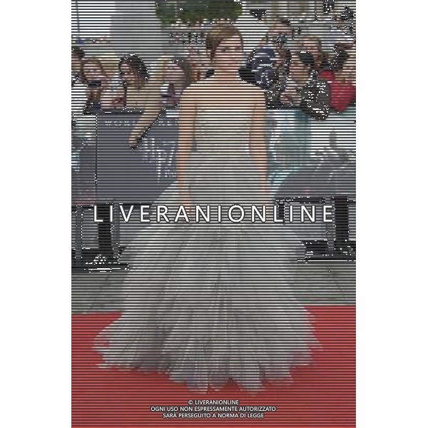 Actress Emma Watson attends the World Premiere of Harry Potter and The Deathly Hallows - Part 2 at Trafalgar Square on July 7, 2011 in London, England.