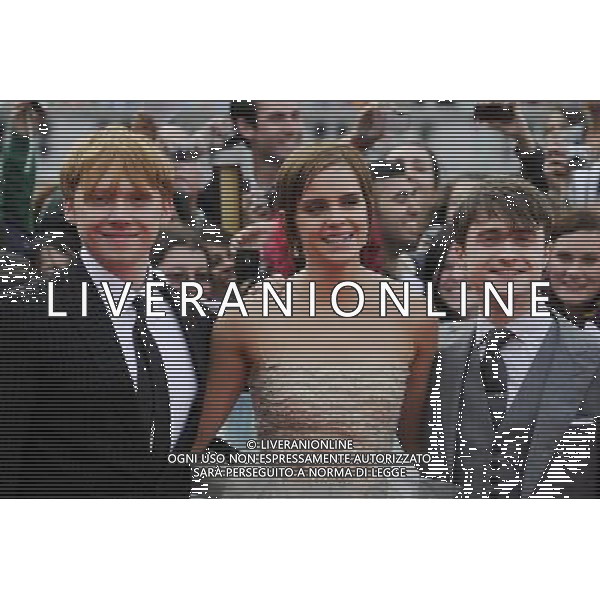 (L-R) Rupert Grint, Emma Watson and Daniel Radcliffe attend the World Premiere of Harry Potter and The Deathly Hallows - Part 2 at Trafalgar Square on July 7, 2011 in London, England.