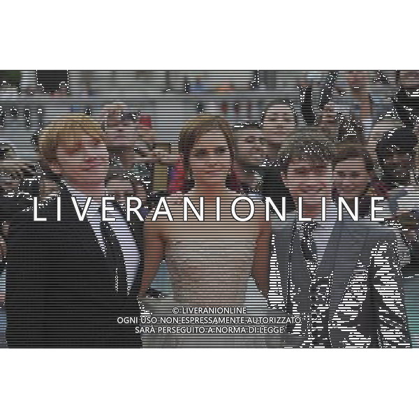 (L-R) Rupert Grint, Emma Watson and Daniel Radcliffe attend the World Premiere of Harry Potter and The Deathly Hallows - Part 2 at Trafalgar Square on July 7, 2011 in London, England.