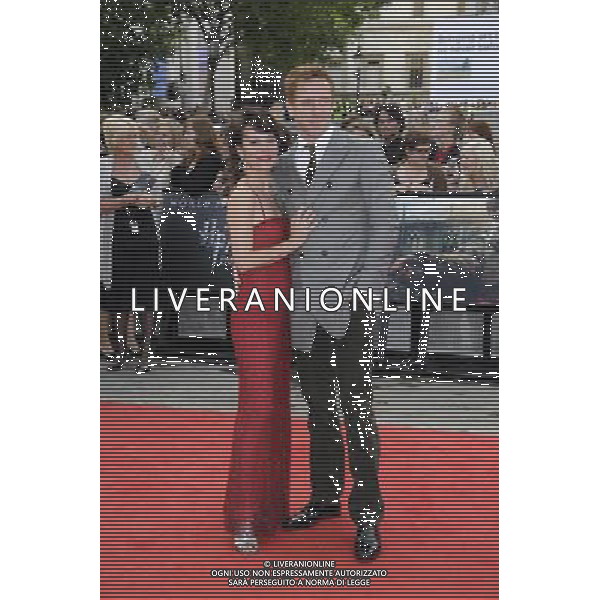 Actors Damian Lewis (L) and Helen McCrory arrive at the World Premiere of \'Harry Potter And The Deathly Hallows Part 2\' in Trafalgar Square on July 7, 2011 in London, England.