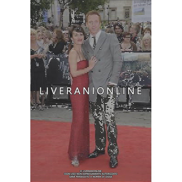 Actors Damian Lewis (L) and Helen McCrory arrive at the World Premiere of \'Harry Potter And The Deathly Hallows Part 2\' in Trafalgar Square on July 7, 2011 in London, England.