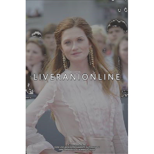 Actress Bonnie Wright arrives at the World Premiere of \'Harry Potter And The Deathly Hallows Part 2\' in Trafalgar Square on July 7, 2011 in London, England.