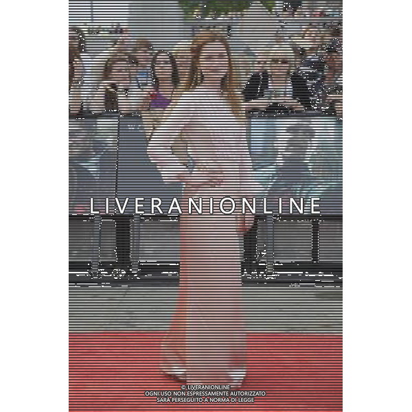 Actress Bonnie Wright arrives at the World Premiere of \'Harry Potter And The Deathly Hallows Part 2\' in Trafalgar Square on July 7, 2011 in London, England.
