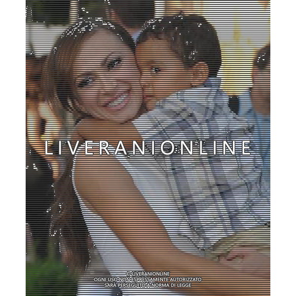 Karina Smirnoff and godson Photo by Gilbert Flores \'Zookeeper\' Los Angeles Premiere at the Regency Village Theatre July 6, 2011 - Westwood, California
