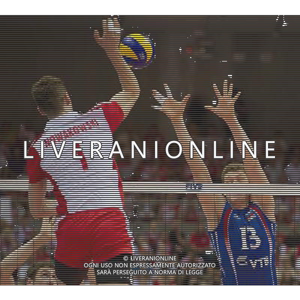 09.07.2011 - Gdansk , ERGO Arena , Siatkowka mezczyzn (Volleyball men\'s) , Finaly Ligi Swiatowej 2011 , FIVB World League Final 2011 , Mecz polfinalowy Polska (biale) - Rosja (niebieskie) N/Z Piotr Nowakowski , Dmitriy Muserkiy Fot. Mariusz Palczynski / Edytor.net / Newspix.pl --- Newspix.pl *** Local Caption *** www.newspix.pl mail us: info@newspix.pl call us: 0048 022 23 22 222 --- Polish Picture Agency by Ringier Axel Springer Poland