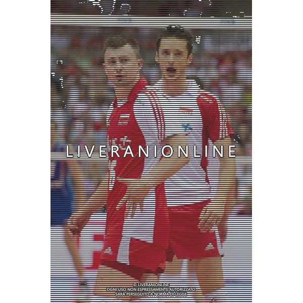 09.07.2011 - Gdansk , ERGO Arena , Siatkowka mezczyzn (Volleyball men\'s) , Finaly Ligi Swiatowej 2011 , FIVB World League Final 2011 , Mecz polfinalowy Polska (biale) - Rosja (niebieskie) N/Z Krzysztof Ignaczak , Lukasz Zygadlo Fot. Mariusz Palczynski / Edytor.net / Newspix.pl --- Newspix.pl *** Local Caption *** www.newspix.pl mail us: info@newspix.pl call us: 0048 022 23 22 222 --- Polish Picture Agency by Ringier Axel Springer Poland