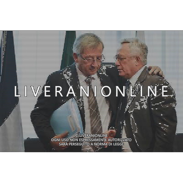 Luxembourg Prime Minister, chairman of eurogroup Jean-Claude Juncker (L) and Italian Finance Minister Giulio Tremonti before signing the treaty establishing the European Stability Mechanism ahead of a euro zone finance ministers meeting in in Brussels, Belgium on 2011-07-11