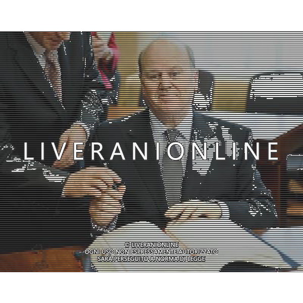 Irish Finance minister Michael Noonan signing the treaty establishing the European Stability Mechanism ahead of a euro zone finance ministers meeting in in Brussels, Belgium on 2011-07-11