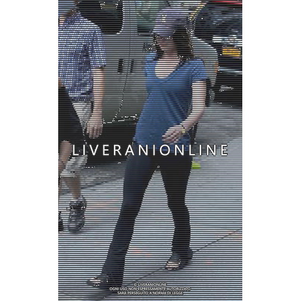 Actress Megan Fox walks to the \'Dictator\' movie set in Midtown Manhattan on July 11, 2011 in New York City.