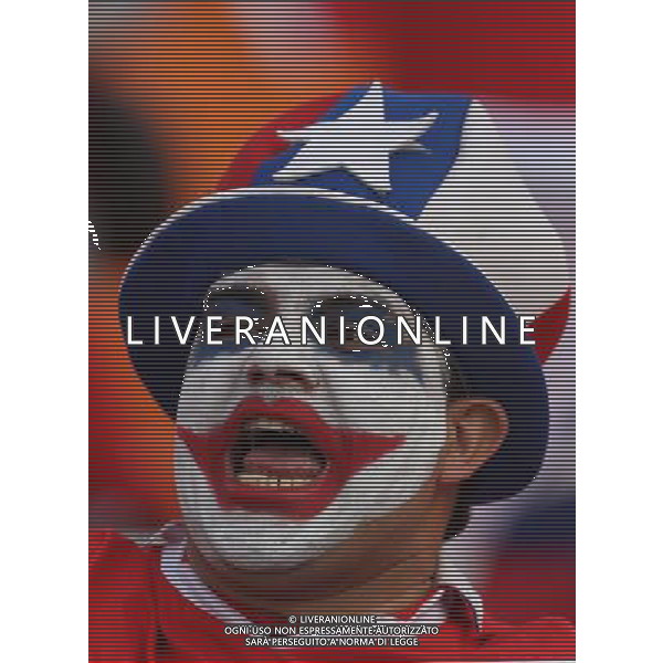 MENDOZA, July 12, 2011 A fan of Chile jubilates before the match between Chile and Peru in the group stage of Copa America 2011, in Mendoza, Argentina, on July 12, 2011. (/Ivan Fernandez) (py)