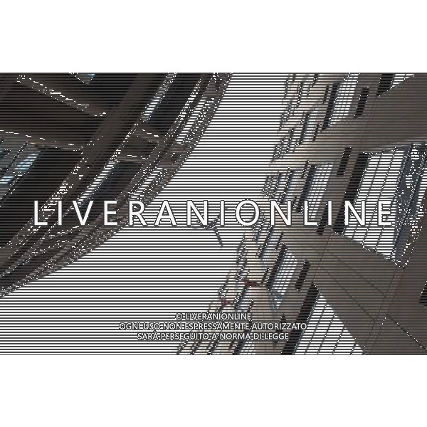 (110714) -- VANCOUVER, July 14, 2011 () -- A Aeriosa Dance Society member performs at the wall of Vancouver Public Library during annual Dancing on the Edge festival in Vancouver, Canada, July 13, 2011. Aeriosa\'s artistic objectives include creating dance in non-traditional environments, exploring aerial choreography and revealing dance in the vertical realm to new audiences. Aeriosa combines contemporary dance technique with expert knowledge of safe rope rigging systems to create three-dimensional performances that re-interpret gravity and respond to the performance location. (/Sergei Bachlakov) (yc)