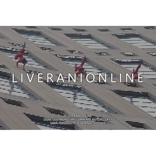 (110714) -- VANCOUVER, July 14, 2011 () -- Aeriosa Dance Society members perform at the walls of Vancouver Public Library during annual Dancing on the Edge festival in Vancouver, Canada, July 13, 2011. Aeriosa\'s artistic objectives include creating dance in non-traditional environments, exploring aerial choreography and revealing dance in the vertical realm to new audiences. Aeriosa combines contemporary dance technique with expert knowledge of safe rope rigging systems to create three-dimensional performances that re-interpret gravity and respond to the performance location. (/Sergei Bachlakov) (yc)