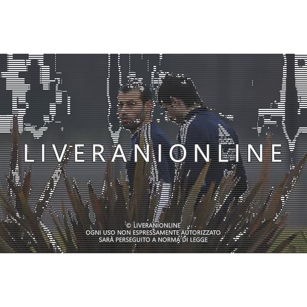 BUENOS AIRES, July 14, 2011 Argentina\'s national soccer team player Javier Mascherano (L) leaves at the end of a training session in Buenos Aires, capital of Argentina, on July 14, 2011. (/Claudio Cruz) (ce)