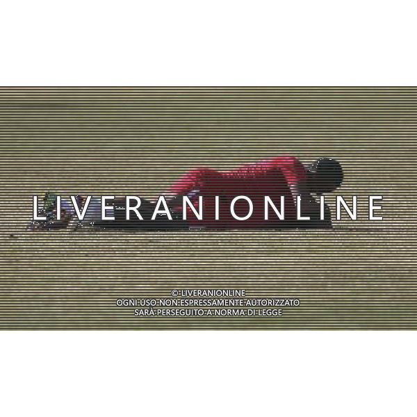 MENDOZA, July 15, 2011 Peru\'s national soccer team players Andre Carrillo (top) and Luis Advincula (bottom) joke during a training session at Chacras de Coria in Mendoza, Argentina, on July 14, 2011. Peru will play against Colombia on July 16 in Cordova during the quarter finals of the Copa America soccer tournament. (/Ivan Fernandez) (ce)