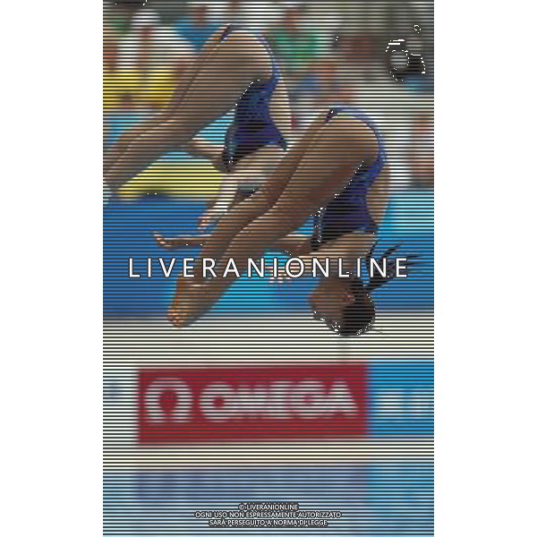 (110716) -- SHANGHAI, July 16, 2011 () -- Wu Minxia and He Zi (front) of China compete in the final of the women\'s 3m synchronized springboard diving event at the 14th FINA World Championships in Shanghai, east China, July 16, 2011. (/Ren Long) (zgp)